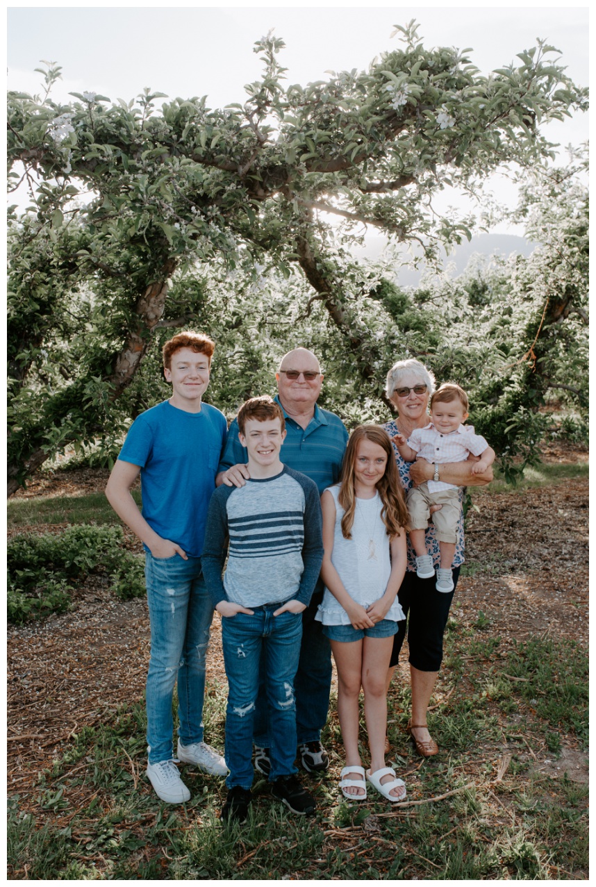 grandkids and grandparents photos in an apple orchard lake chelan