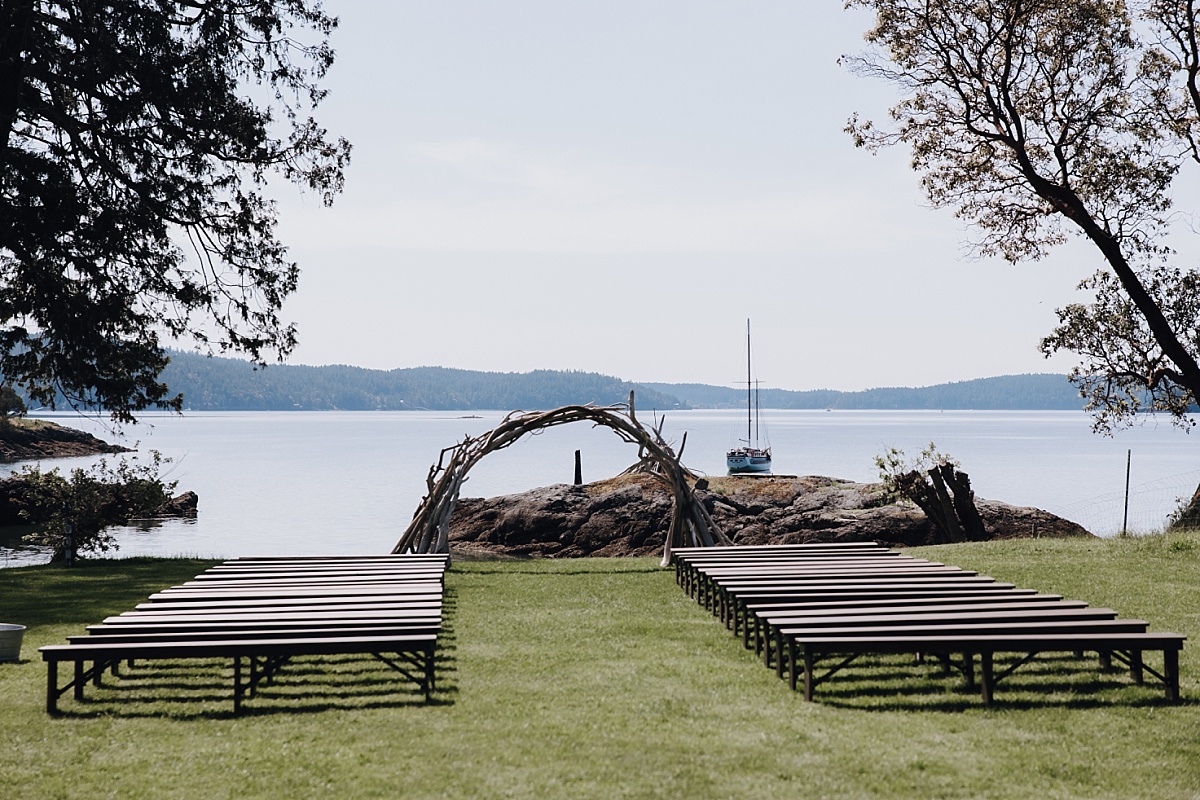 Wide shot of wedding ceremony overlooking Orcas Island coastline