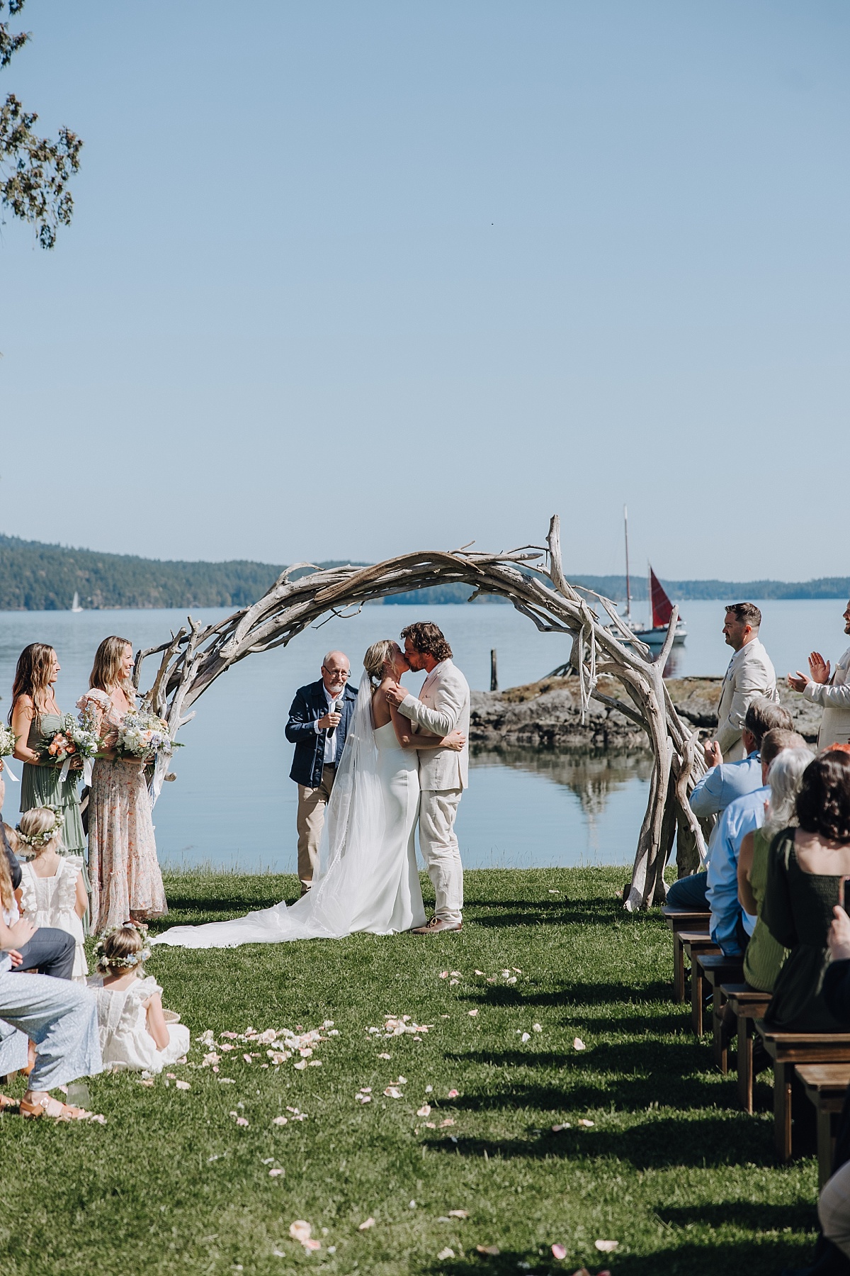 Wide shot of wedding ceremony overlooking Orcas Island coastline