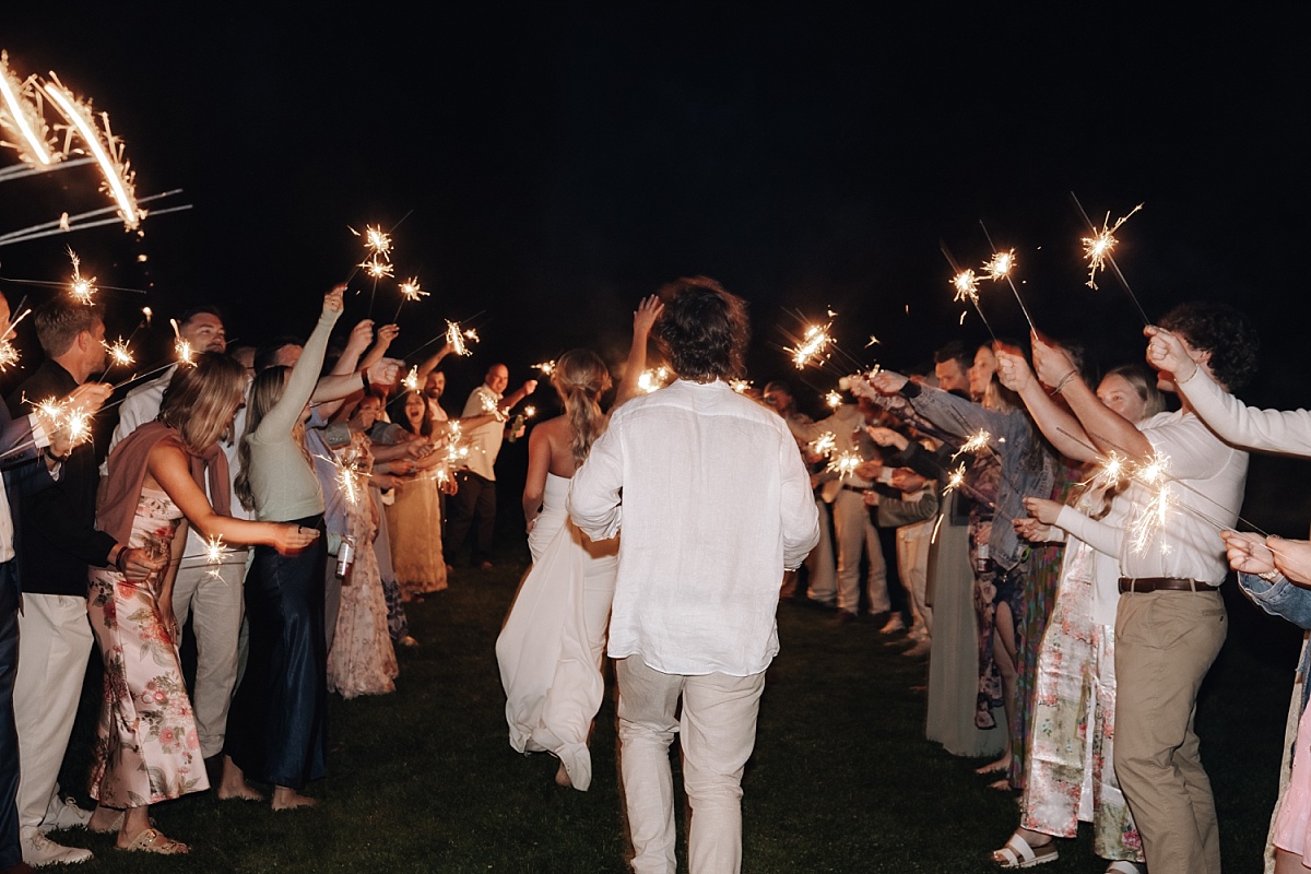 Joyful couple celebrating their Orcas Island wedding 