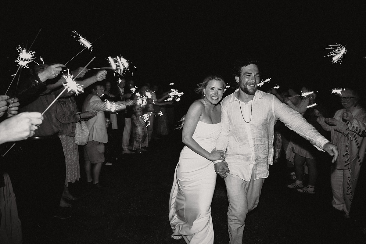 Joyful couple celebrating their Orcas Island wedding 